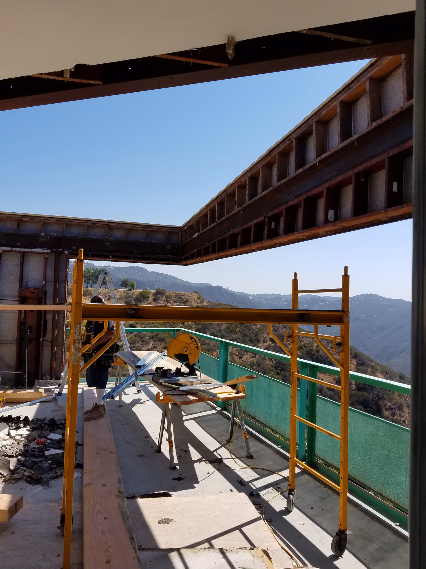 Exterior scaffolding and safety netting around the Rambla Pacifico structure